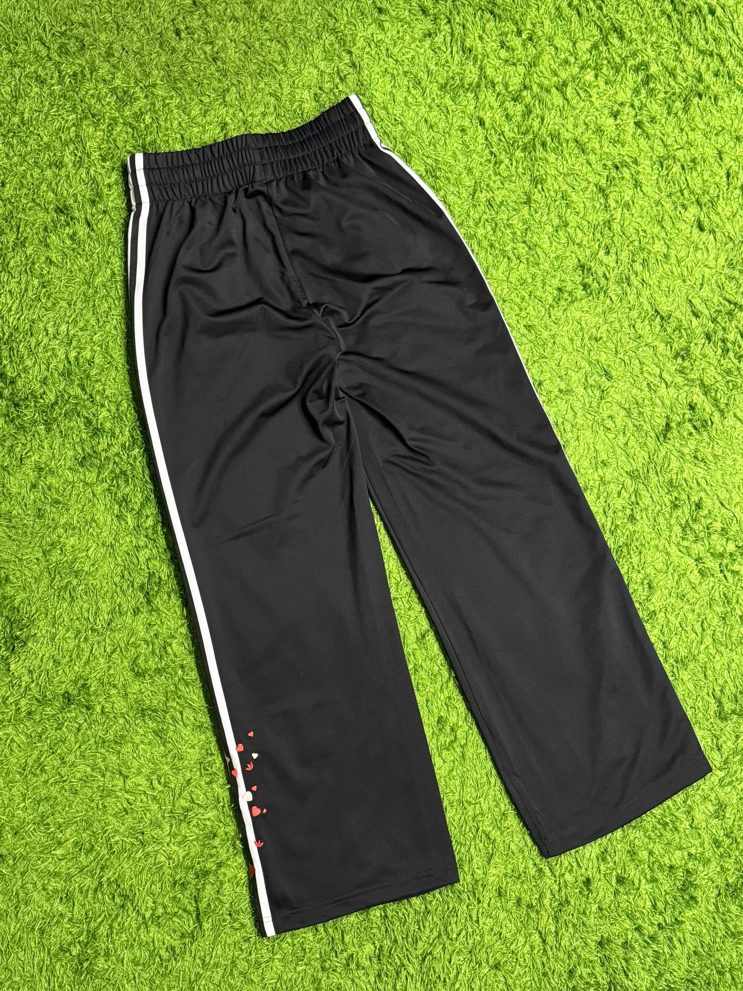 Spodnie dresowe czarne z kwiatkami Adidas Originals Firebird baggy pants