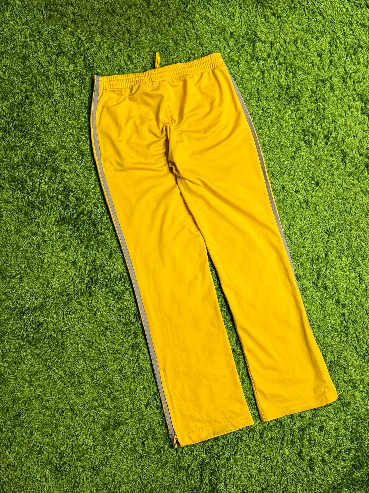 Spodnie dresowe żółte Adidas Originals Firebird