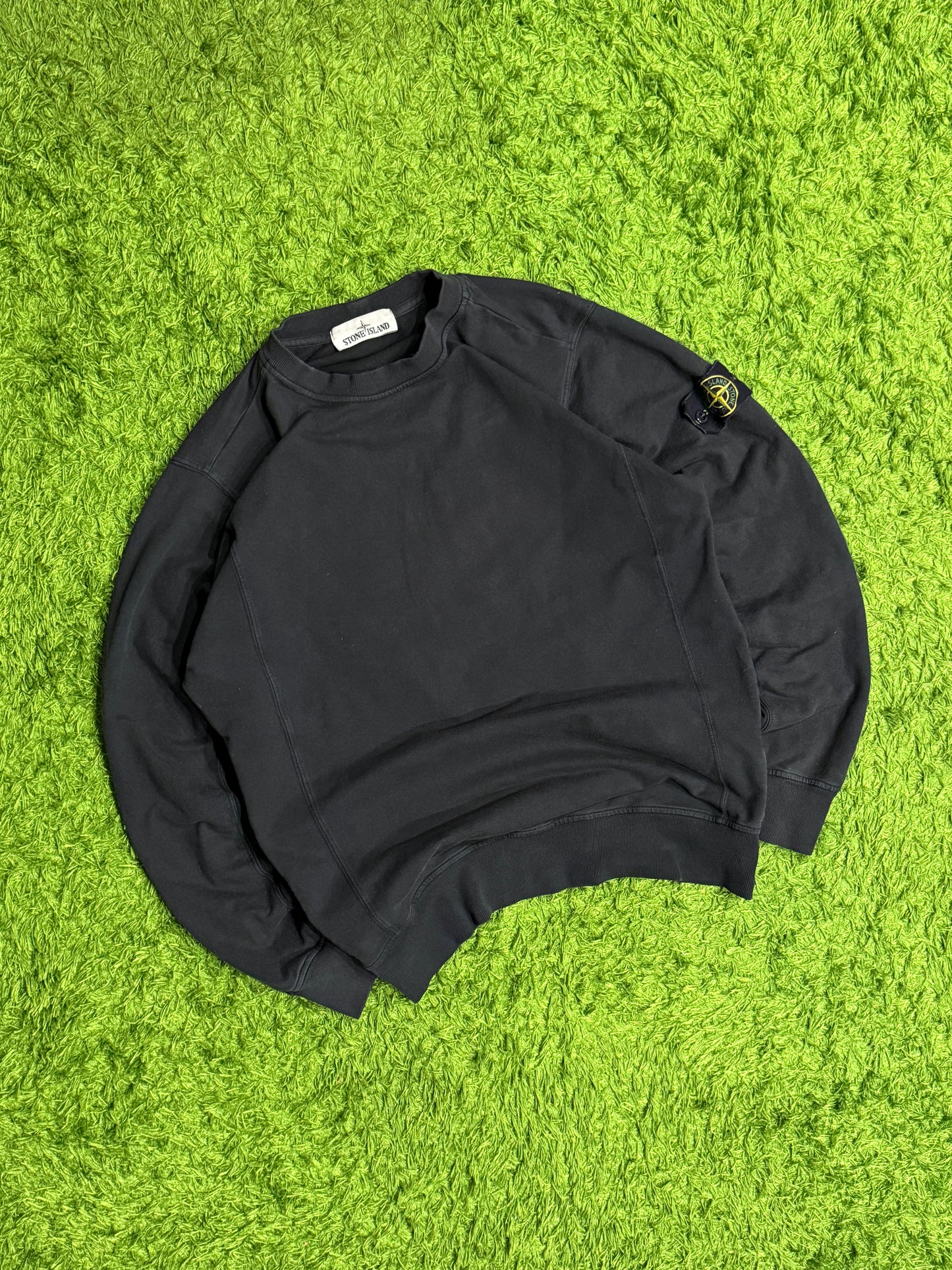 Czarna bluza Stone Island z patką