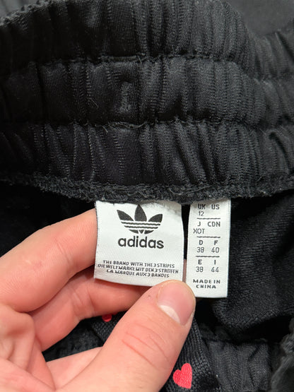 Spodnie dresowe czarne z kwiatkami Adidas Originals Firebird baggy pants