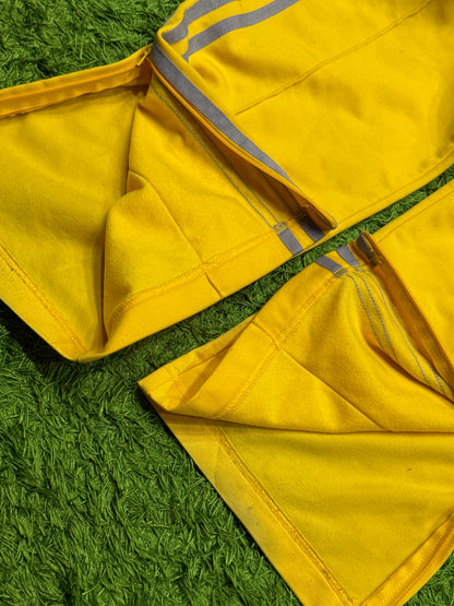 Spodnie dresowe żółte Adidas Originals Firebird
