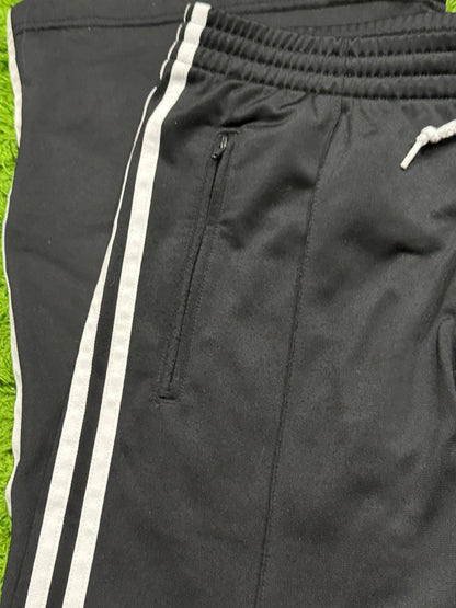 Spodnie dresowe czarne Adidas Originals Firebird dzwony