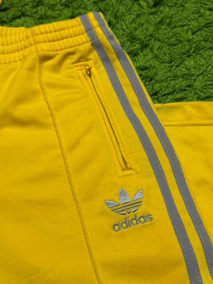Spodnie dresowe żółte Adidas Originals Firebird